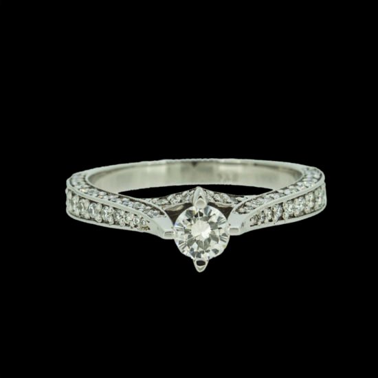 Gold and Diamond ring with quarter carat diamond in center