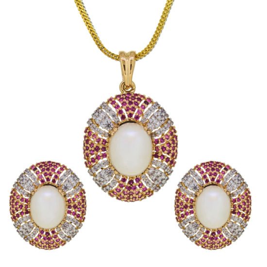 Gold locket set with zircons, ruby and pearls