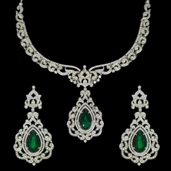 Gold Necklace set with diamonds and green gemstone