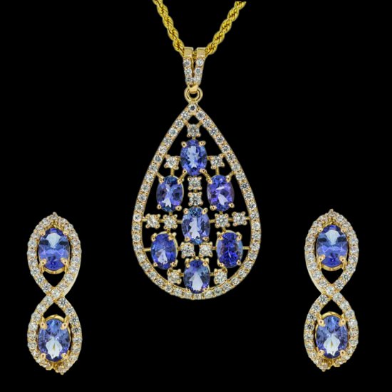 Gold pendant set studded with diamonds and tanzanite gemstones