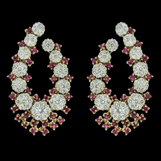 Gold earrings studded with diamonds and rubies