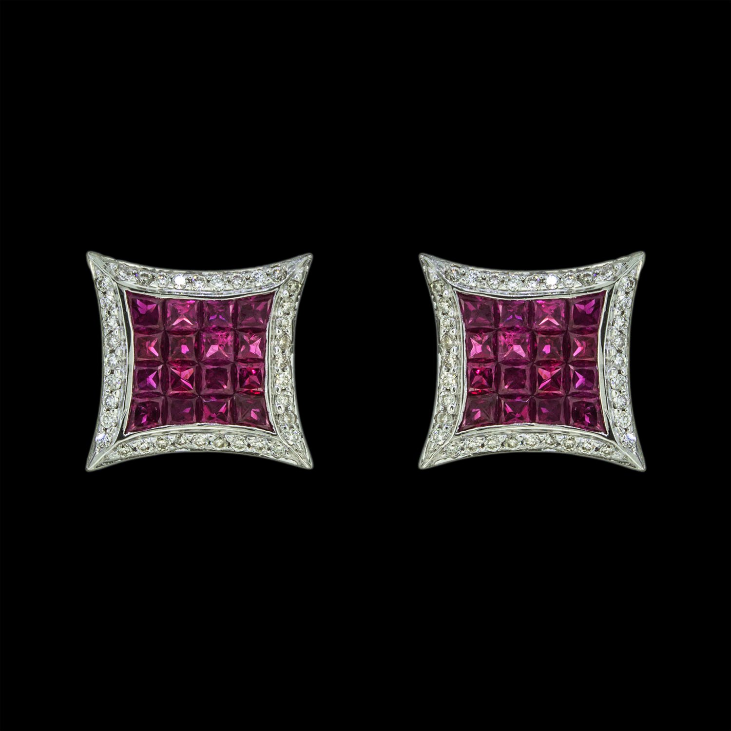 Gold earrings studded with diamonds and rubies